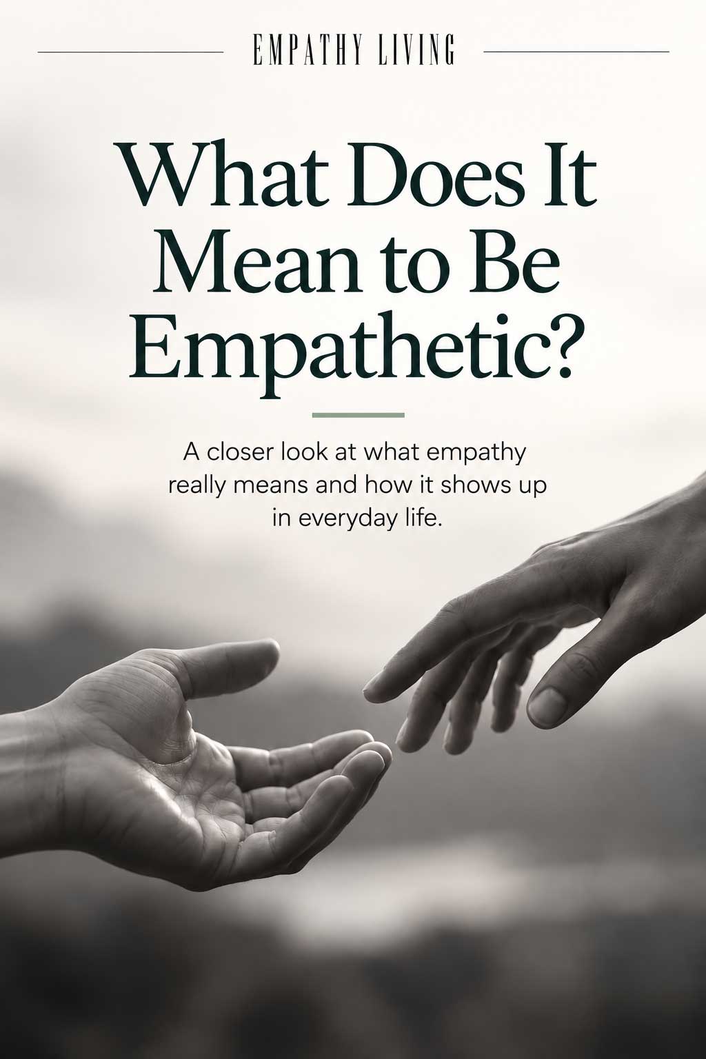 Pinterest graphic for What Does It Mean to Be Empathetic? showing two hands reaching toward one another